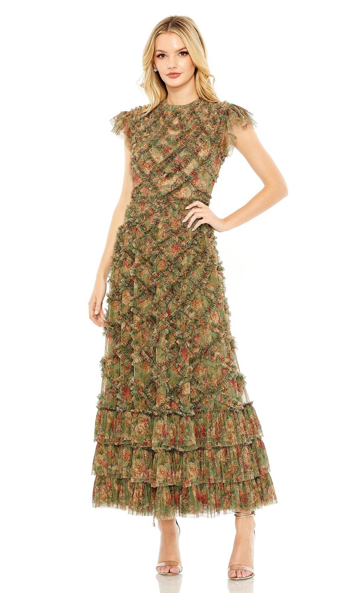 Woman wearing the Knee Length Wedding Guest Dress 8009 by Mac Duggal, featuring short sleeves and a green and brown textured floral pattern—an elegant choice for wedding guests.